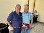 President Karl Diekman receives a commemorative plaque and pin from Immediate Past President (IMPP) Shawn Seyk.